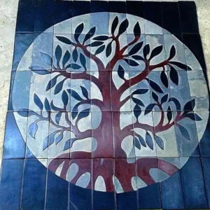 Stone Carving of a Brown Tree with Several Limbs and Large Green Leaves - Front View Grid Squares Light and Dark Blues