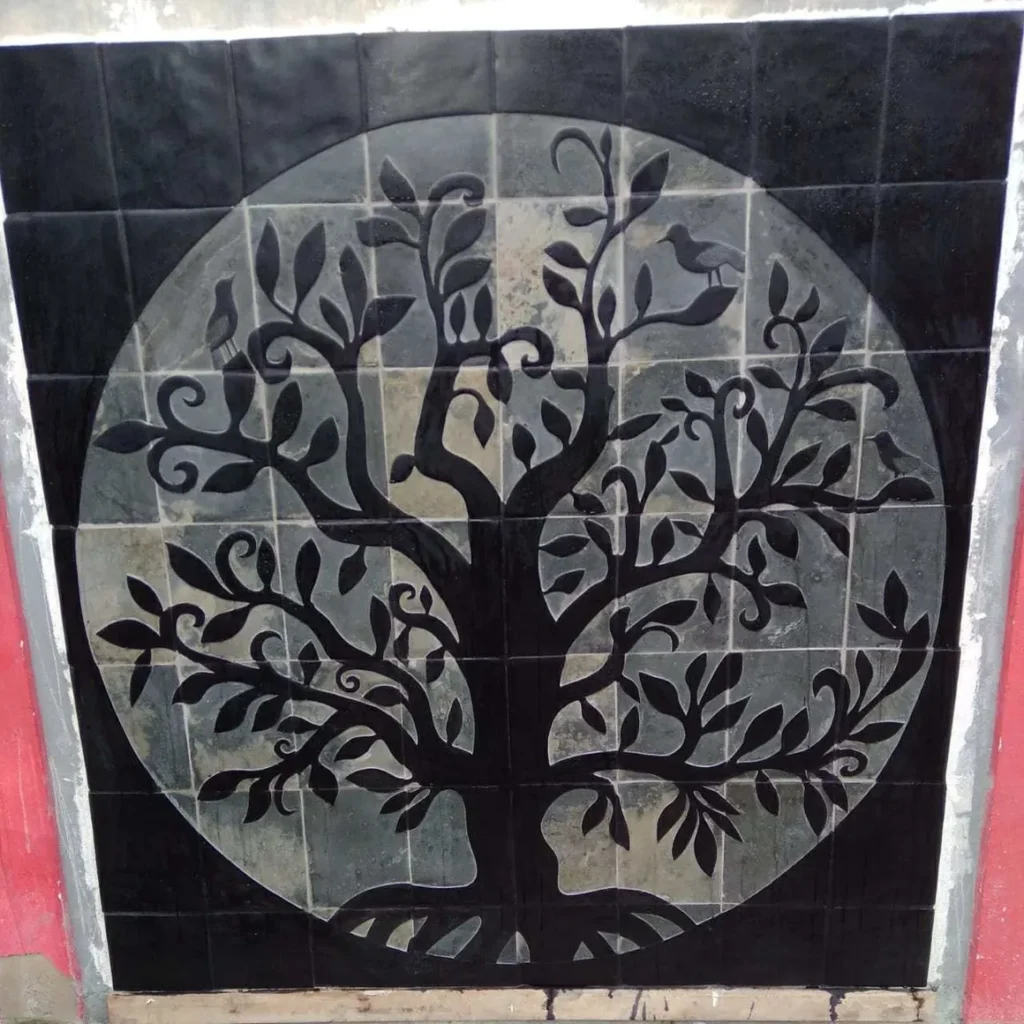Stone Carving of a Tree with Several Limbs and Large Leaves - Front View Grid Squares