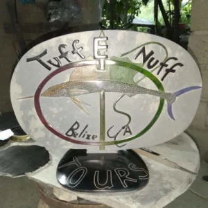 Stone Carving in Red and Green Colors with Tuff E Nuff in Black Belize CA and Tours in Black Stone